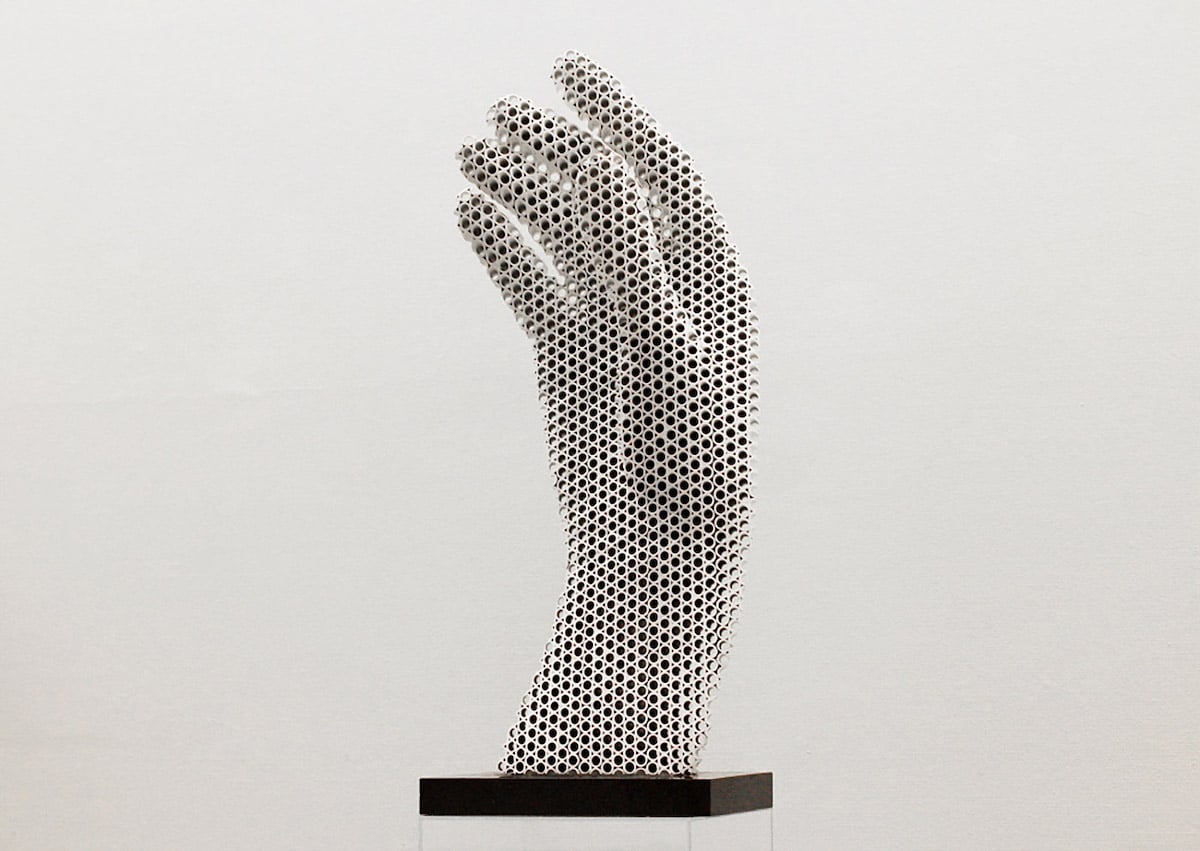 Sculptor Creates Mesmerizing Halftone Sculptures from Hundreds of Metal Pipes