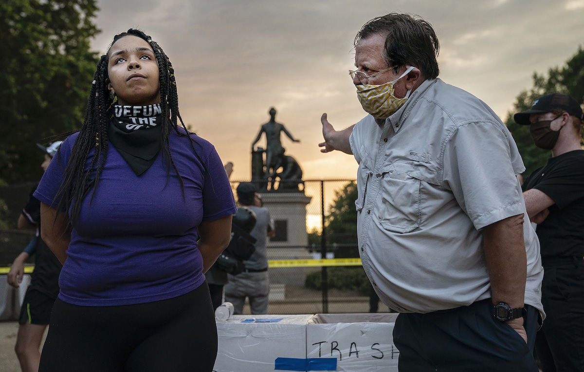 Man and Woman Disagreeing on the Removal of the Emancipation Memorial in Washington, DC