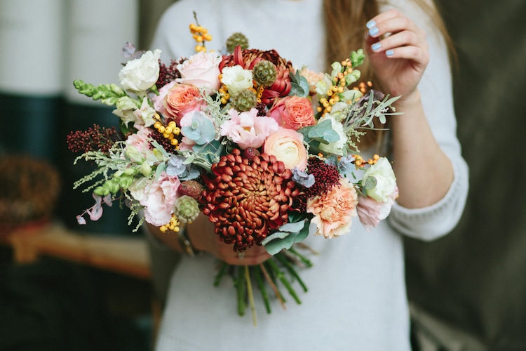 Woman Holding a Bouquet