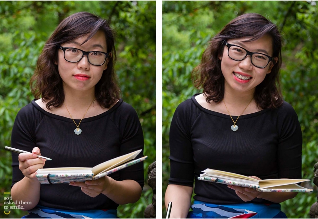 A Young woman holding a book smiles in China