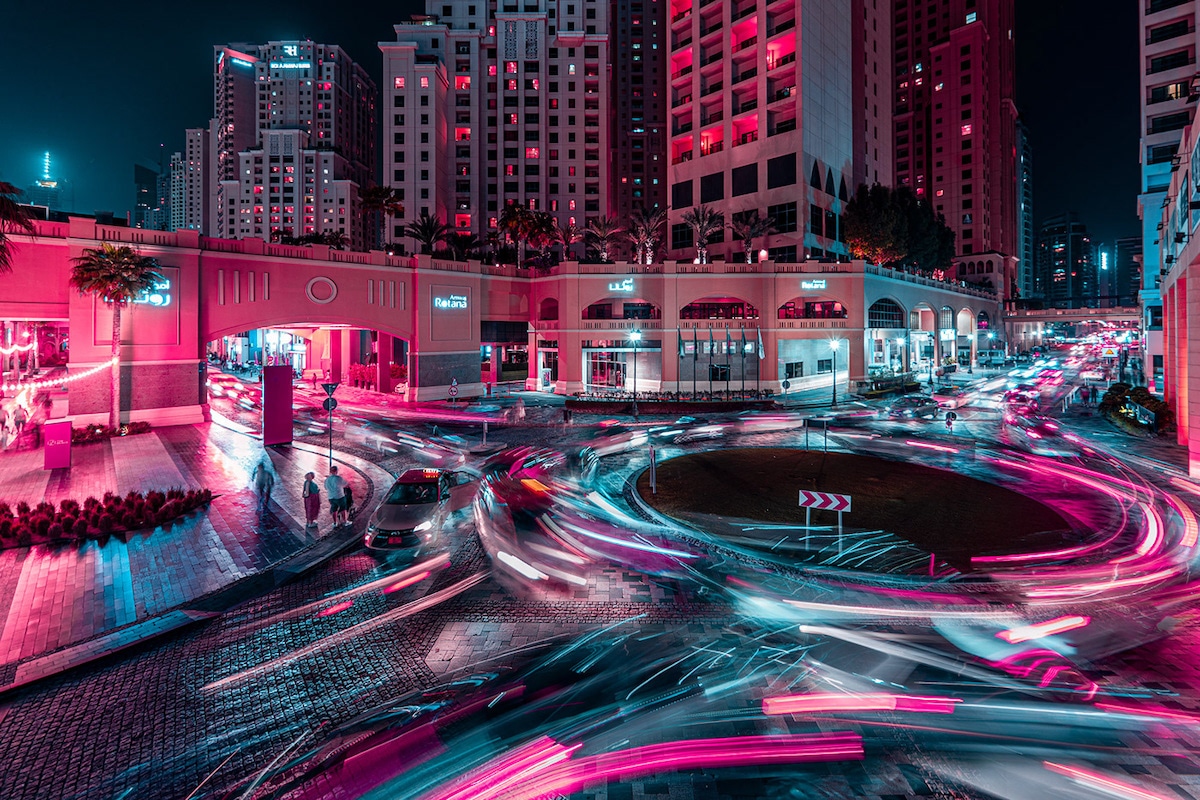 Cars Buzzing at Busy Intersection in Dubai