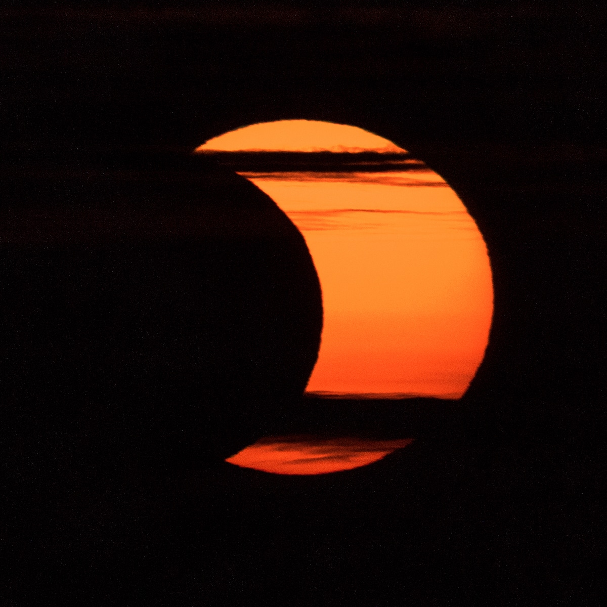 Partial Solar Eclipse Over the Capitol Building
