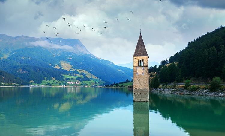 Lake Resia and Curon Bell Tower in Italy in South Tyrol Region