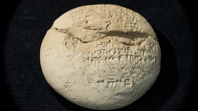 On the back of the Babylonian tablet we see text, written in cuneiform