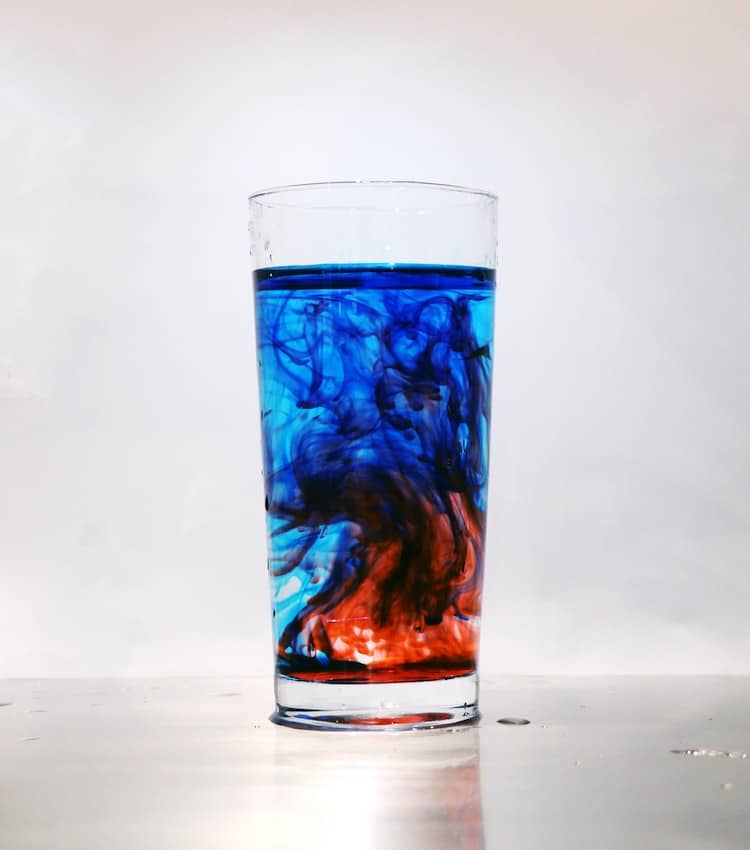 Ink Swirling in a Glass of Water