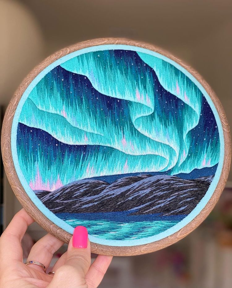Hoop Art Featuring Northern Lights Over Mountains