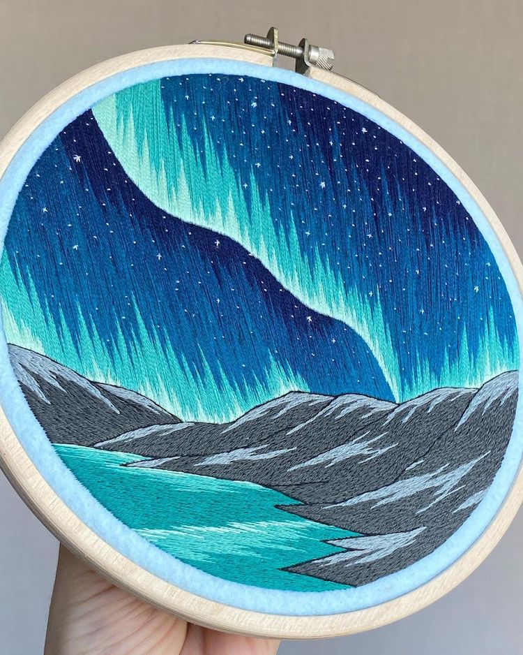 Hoop Art Featuring Northern Lights Over Mountains