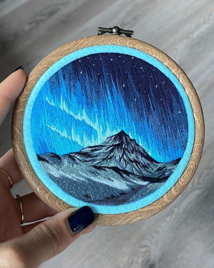 Hoop Art Featuring Northern Lights Over Mountains