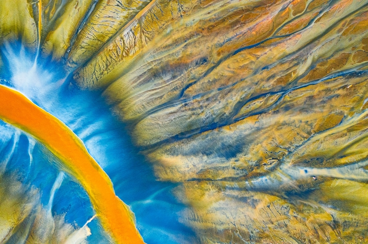 Aerial Photo of River Filled with Mining Waste