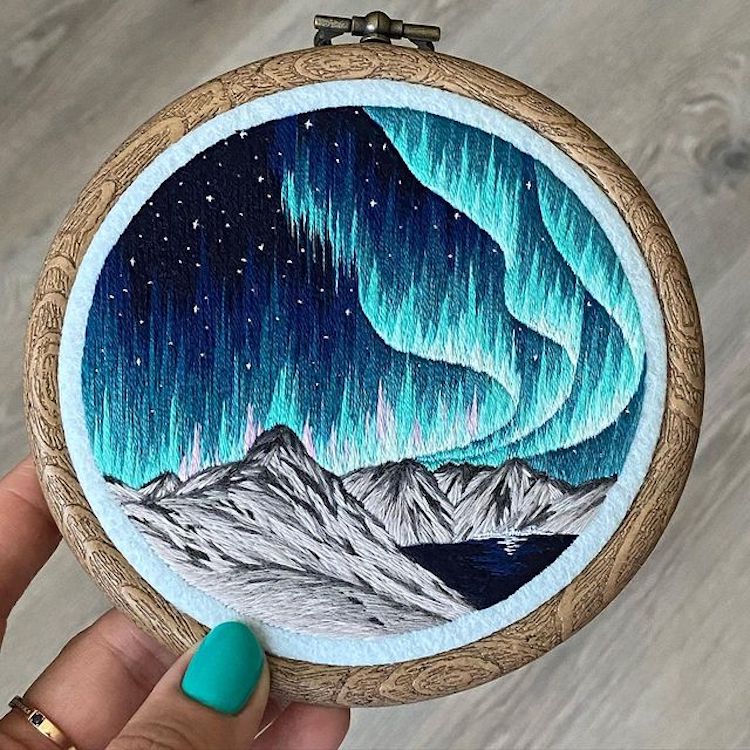 Hoop Art Featuring Northern Lights Over Mountains