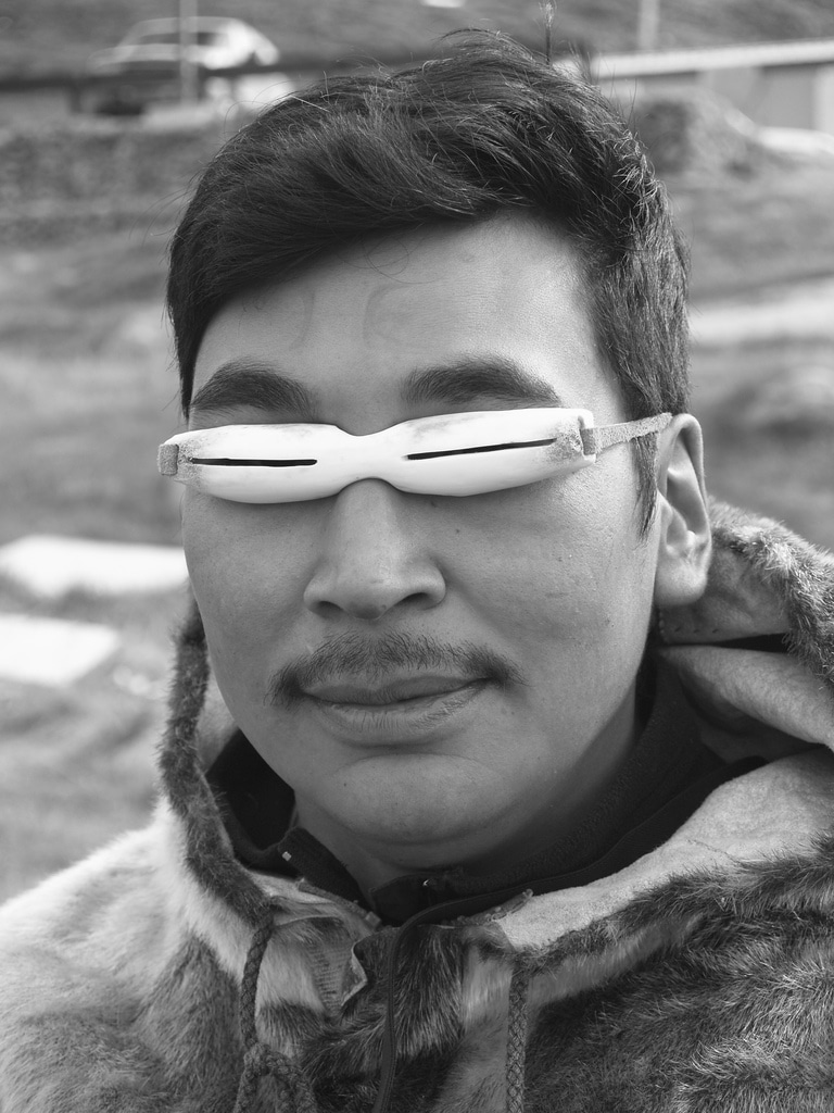 Man Wearing Inuit Snow Goggles
