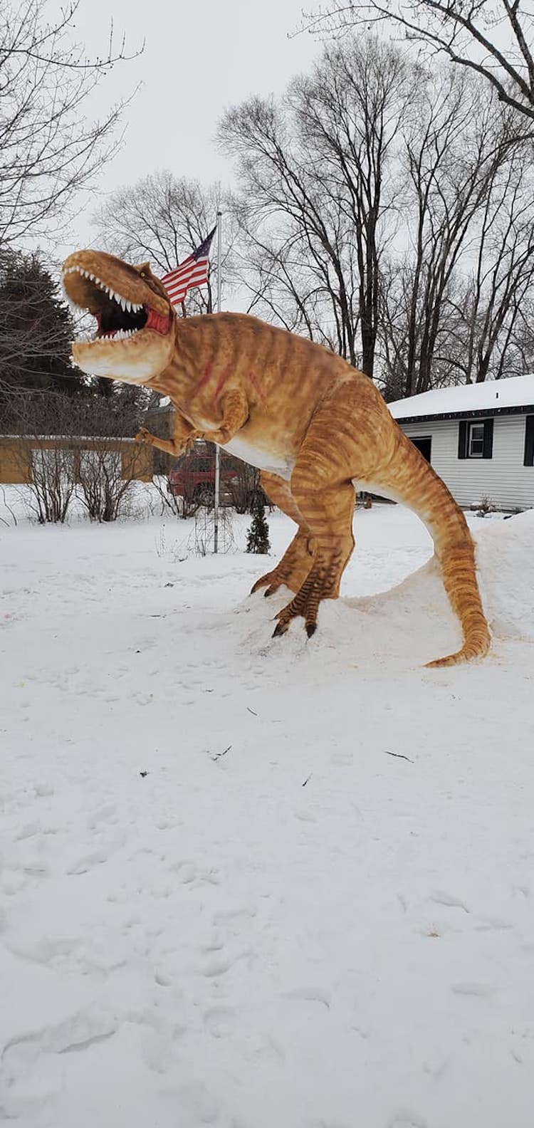 T-Rex Snow Sculpture by Paul Larcom