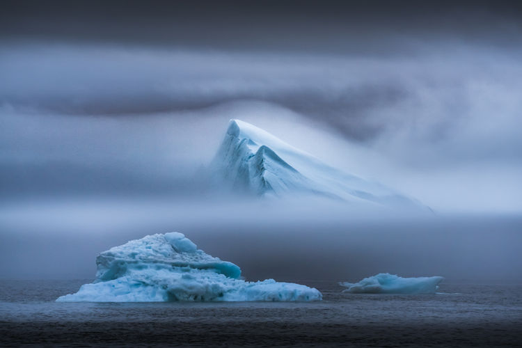Iceberg in Greenland Surrounded by Fog