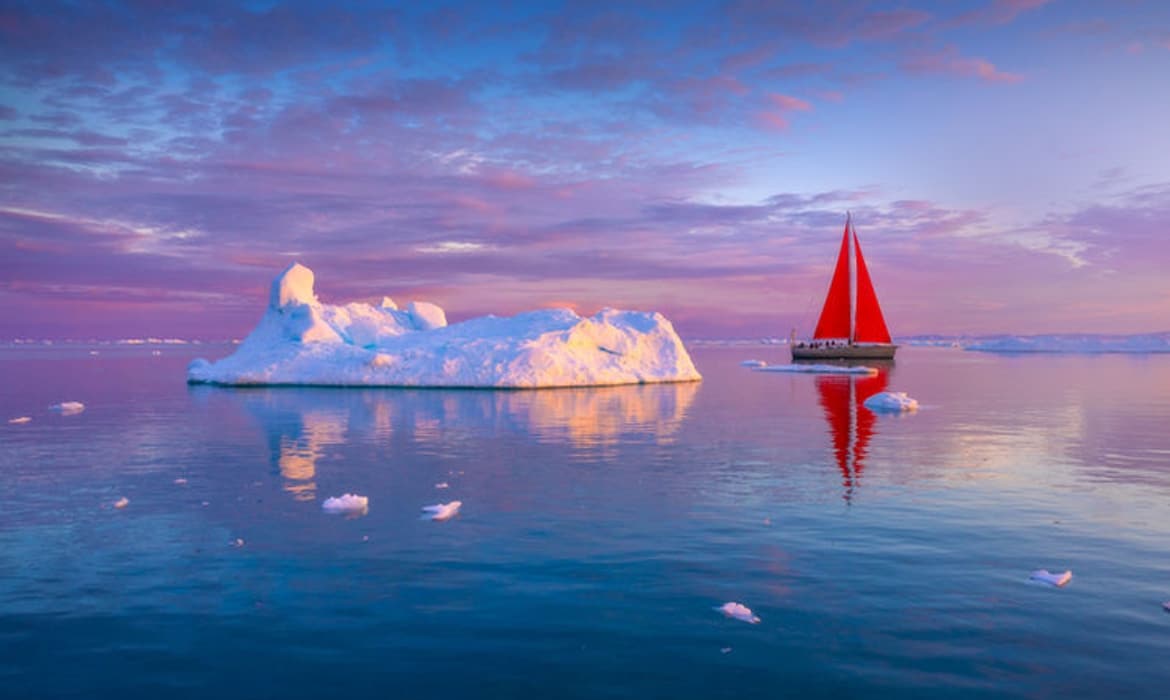 Sailboat Next to an Iceberg in Disko Bay