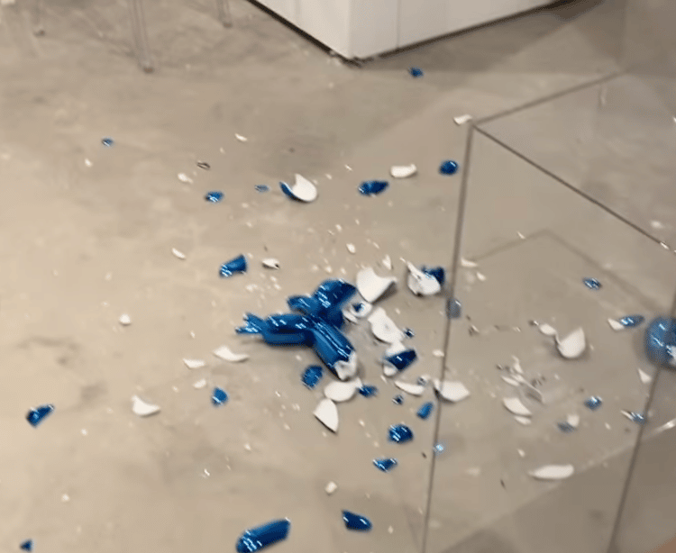 Jeff Koons Balloon Dog Sculpture is Broken by Visitor