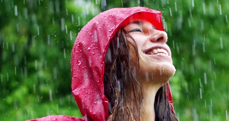 Smiling Girl Under the Rain