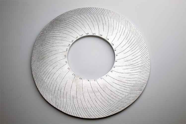 Circle-shaped custom made metal measuring instrument by Rick Salafia