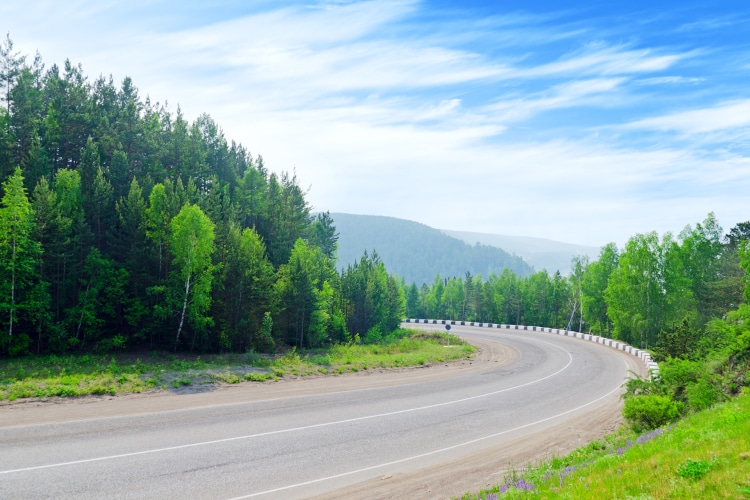 Mountain road under a blue sky