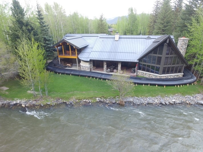 AquaDam installed around home in Sun Valley, ID in anticipation of a flood.