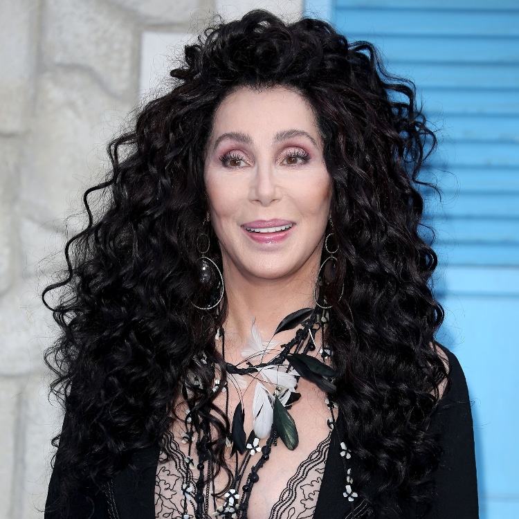 Cher with big curly hair