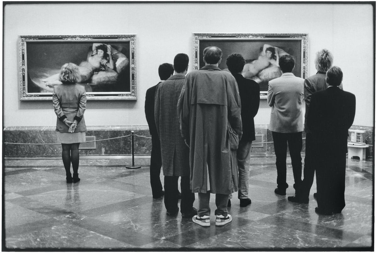 - ViralBandit People standing in front of a painting at the Prado Museum by Elliott Erwitt