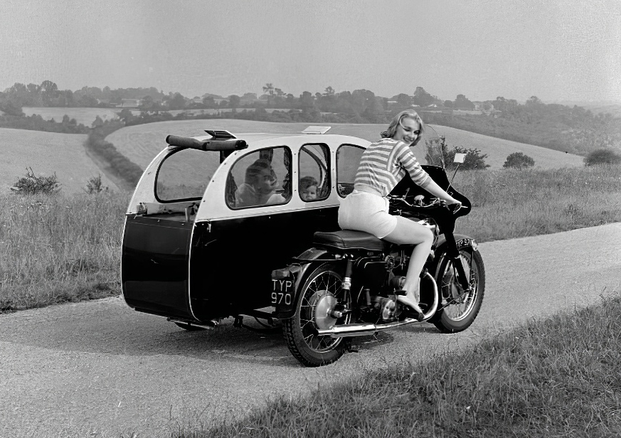 Two Women Demonstrate How to Turn This Sidecar in to a Small Caravan With Two Beds in 1958 » Design You Trust