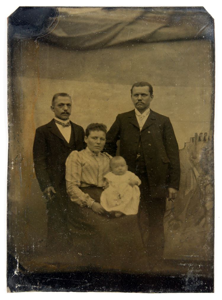 Vintage Tintype Photo Of Two Men, A Woman, And An Infant